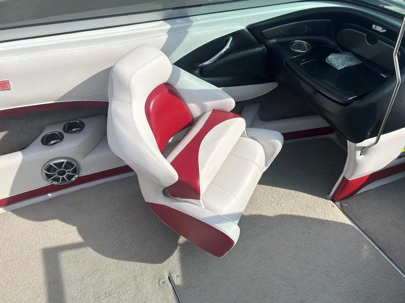 Slide: The Image of Interior of 2013 Crownline 21 SS boat with red and white seating. - 17