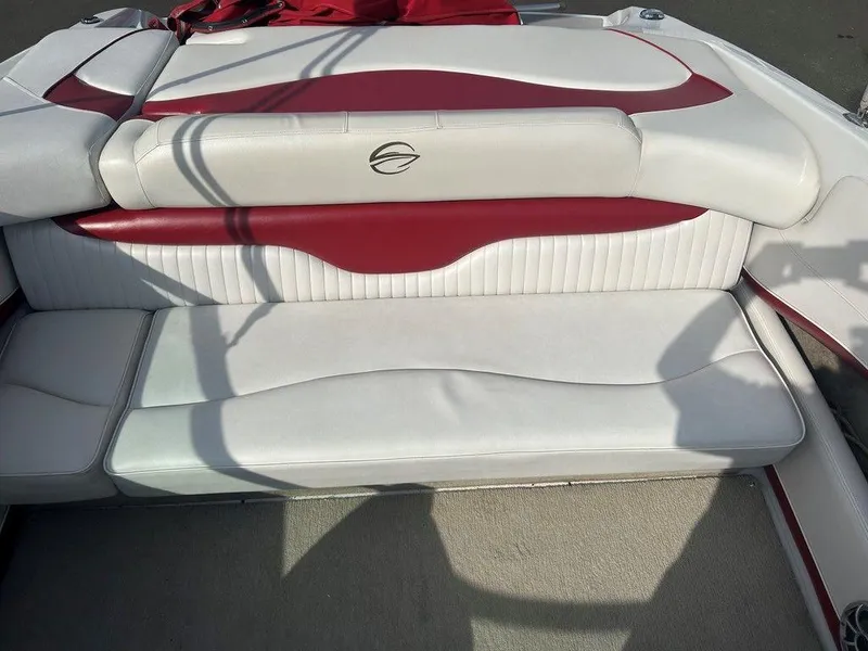 Slide: The Image of 2013 Crownline 21 SS boat interior with red and white seating. - 18