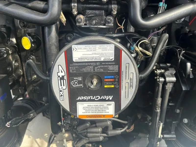 Slide: The Image of Engine of 2013 Crownline 21 SS boat, featuring MerCruiser 4.3L KS. - 28