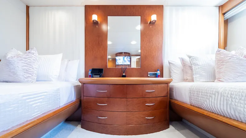 Slide: The Image of Luxurious cabin interior of 1997 Feadship TASIA yacht with twin beds and elegant wood furnishings. - 25