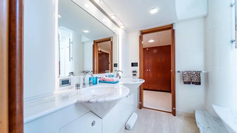 Slide: The Image of Luxurious bathroom on Feadship TASIA yacht, featuring elegant fixtures and modern design, built in 1997. - 30