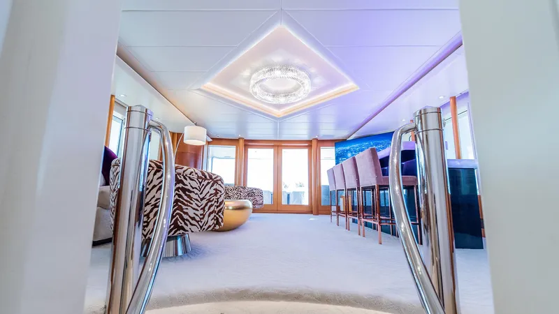 Slide: The Image of Luxurious interior of 1997 Feadship TASIA yacht with elegant seating and modern lighting. - 32
