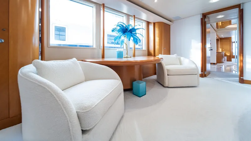 Slide: The Image of Luxurious interior of 1997 Feadship TASIA yacht with elegant seating and modern decor. - 8