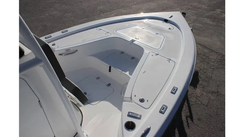 Slide: The Image of 2025 Sea Pro 230 Bay boat deck, featuring spacious storage compartments and sleek design. - 6