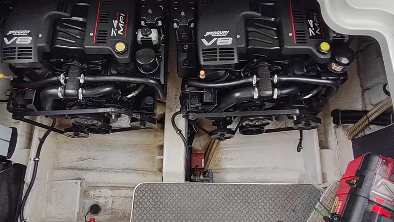 Slide: The Image of Twin MerCruiser V8 engines in a 2000 Formula 31PC boat. - 15