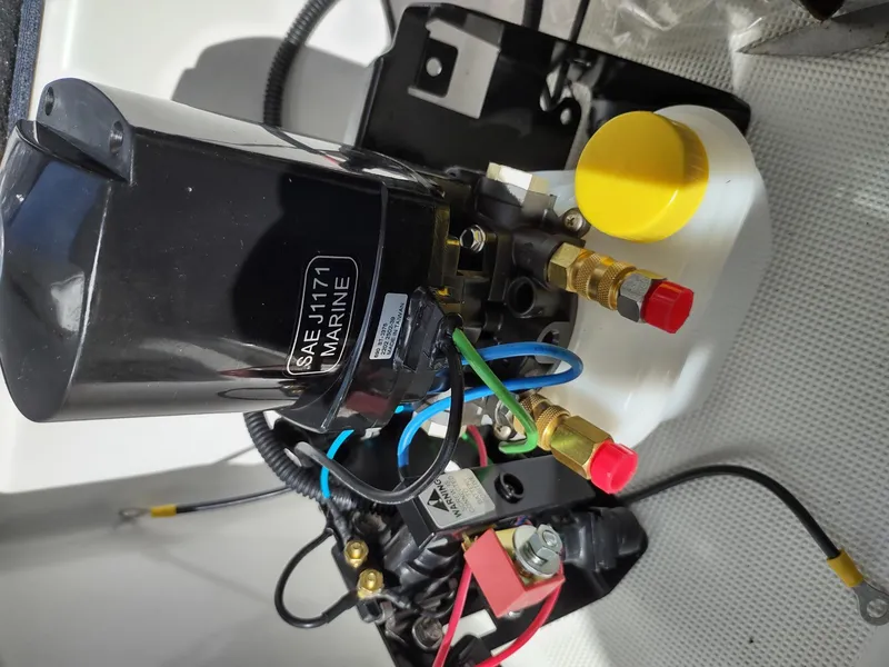 Slide: The Image of Marine engine component with wiring and connectors, Formula 31PC, 2000 model. - 16