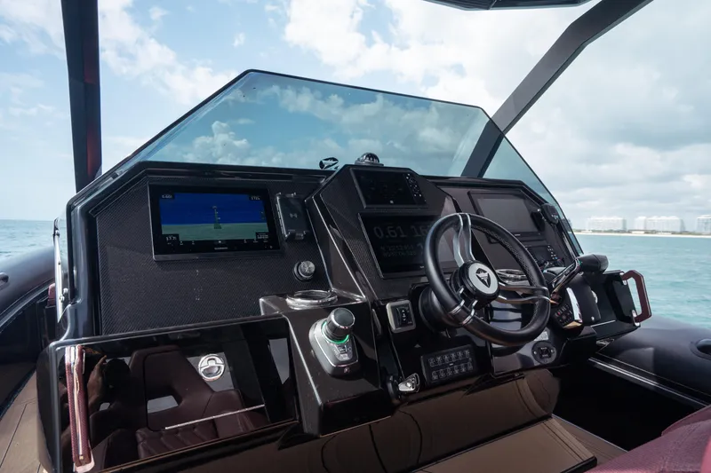 Slide: The Image of Modern helm of 2023 Skipper-BSK 42NC boat with advanced navigation controls. - 3