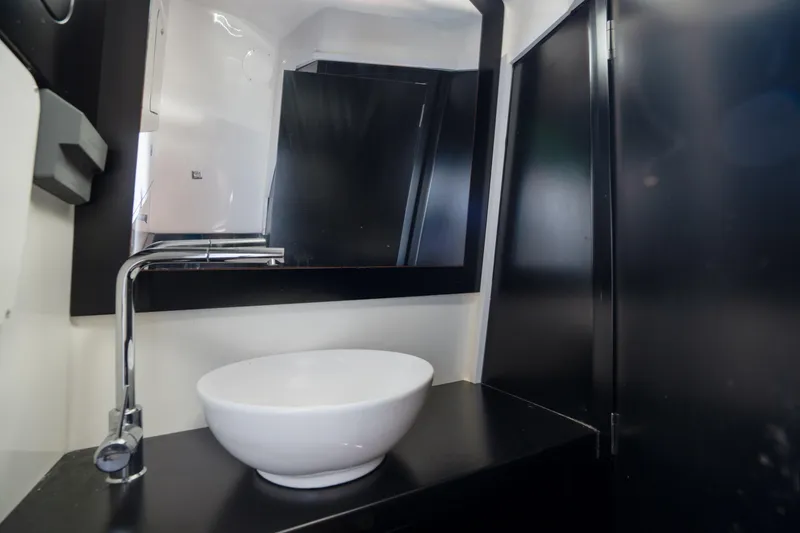 Slide: The Image of Modern bathroom interior in 2023 Skipper-BSK 42NC yacht with sleek sink and mirror. - 6