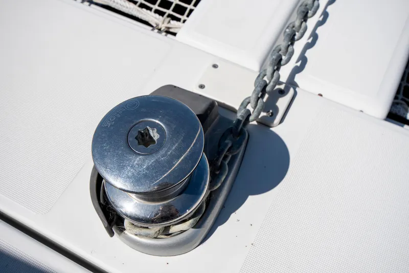 Slide: The Image of Anchor winch on 2017 Lagoon 42 catamaran deck with chain. - 19