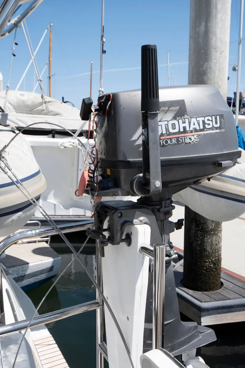 Slide: The Image of Outboard motor on a 2017 Lagoon 42 catamaran docked at a marina. - 28