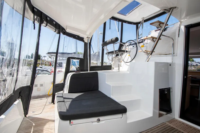 Slide: The Image of Interior view of 2017 Lagoon 42 catamaran with seating and helm station. - 35