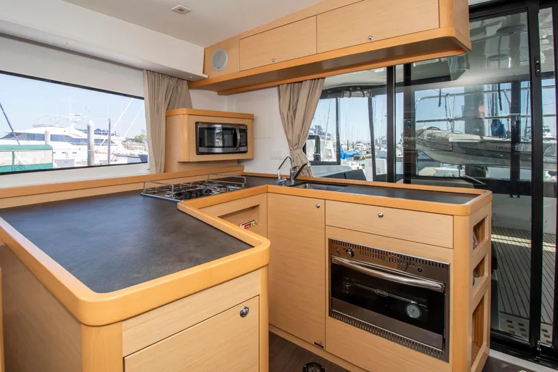 Slide: The Image of Modern kitchen interior of 2017 Lagoon 42 yacht with appliances and ample counter space. - 38
