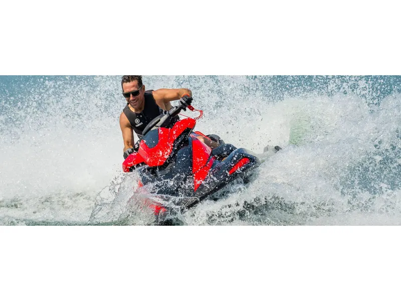 Slide: The Image of 2024 Yamaha Boats VX Limited jet ski cutting through waves with rider. - 9