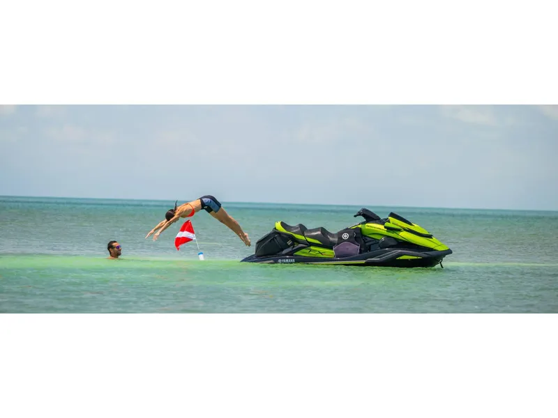Slide: The Image of 2024 Yamaha FX Cruiser SVHO with Audio in ocean, person diving nearby. - 11
