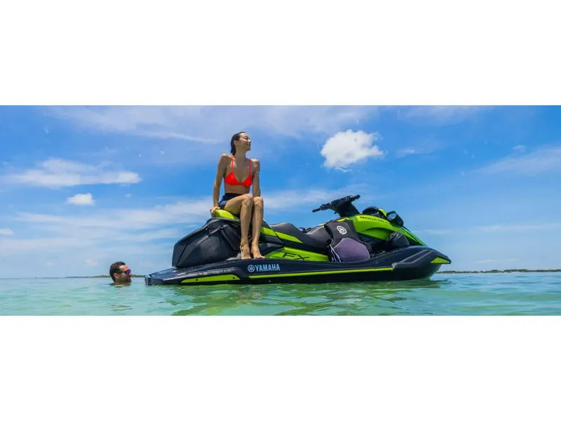 Slide: The Image of 2024 Yamaha FX Cruiser SVHO with Audio on water, featuring a person enjoying the ride. - 9