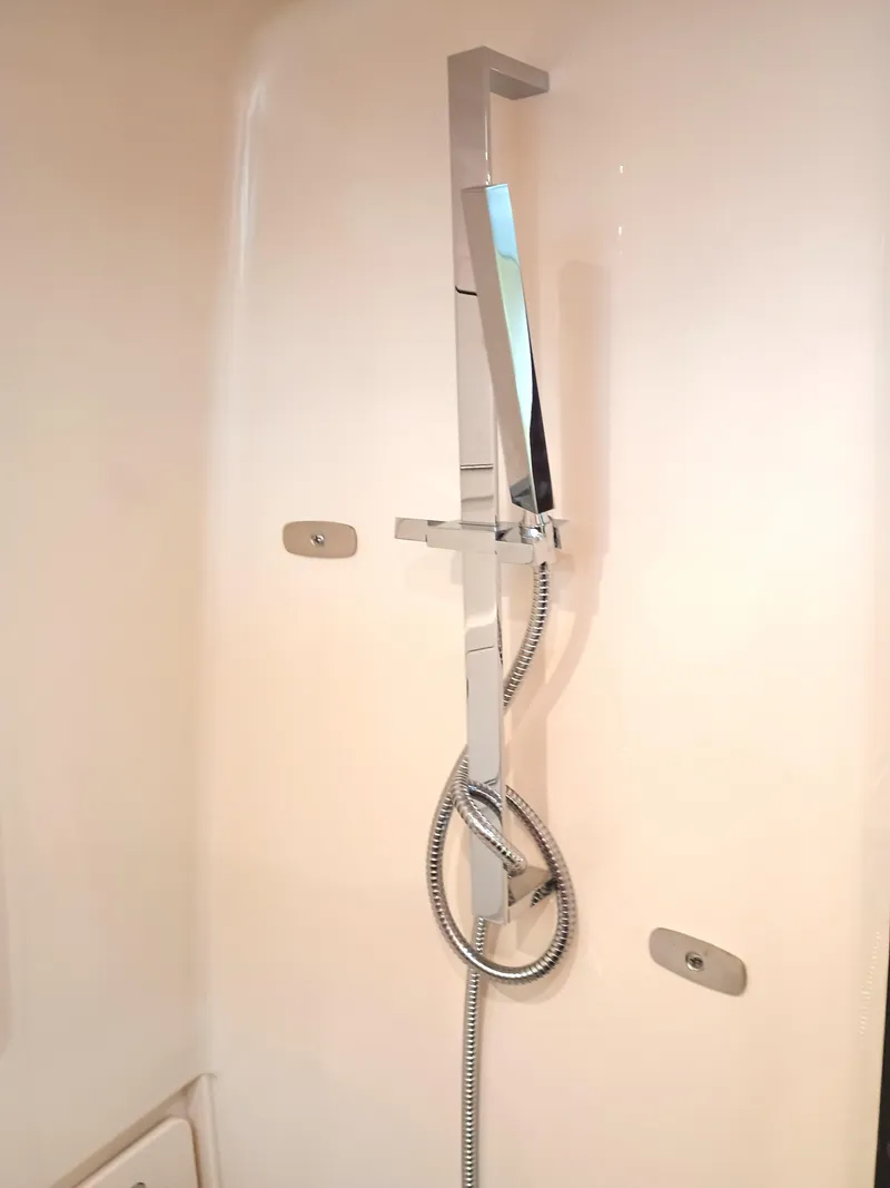 Slide: The Image of Modern shower fixture in 2025 Grady-White Canyon 386 boat bathroom. - 21