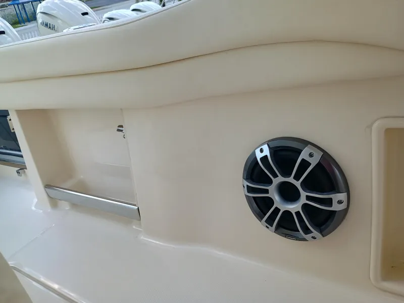 Slide: The Image of 2025 Grady-White Canyon 386 boat interior with speaker and storage compartment. - 32
