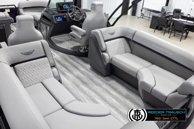 Slide: The Image of Luxurious interior of 2025 Bennington 22 MFBSE pontoon boat with plush seating. - 11