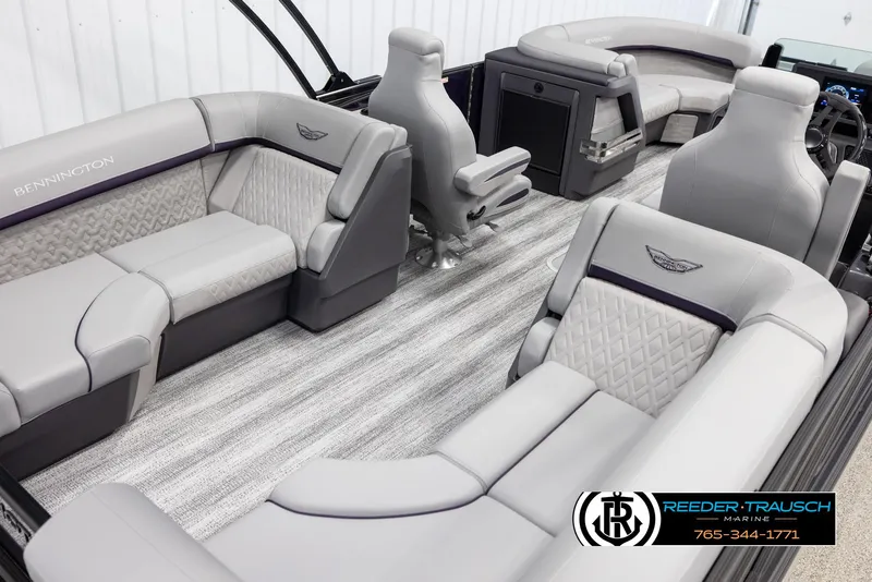 Slide: The Image of 2025 Bennington 22 MFBSE pontoon boat interior with luxurious seating and modern design. - 12