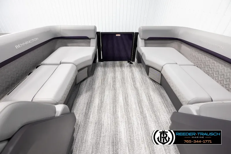 Slide: The Image of 2025 Bennington 22 MFBSE boat interior with gray seating and carpet flooring. - 15