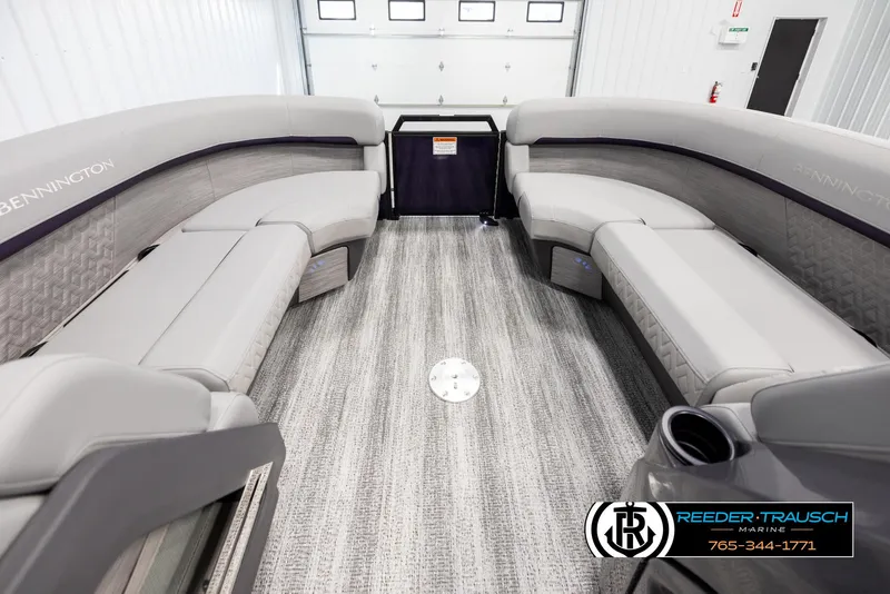 Slide: The Image of 2025 Bennington 22 MFBSE pontoon boat interior with plush seating and modern design. - 19