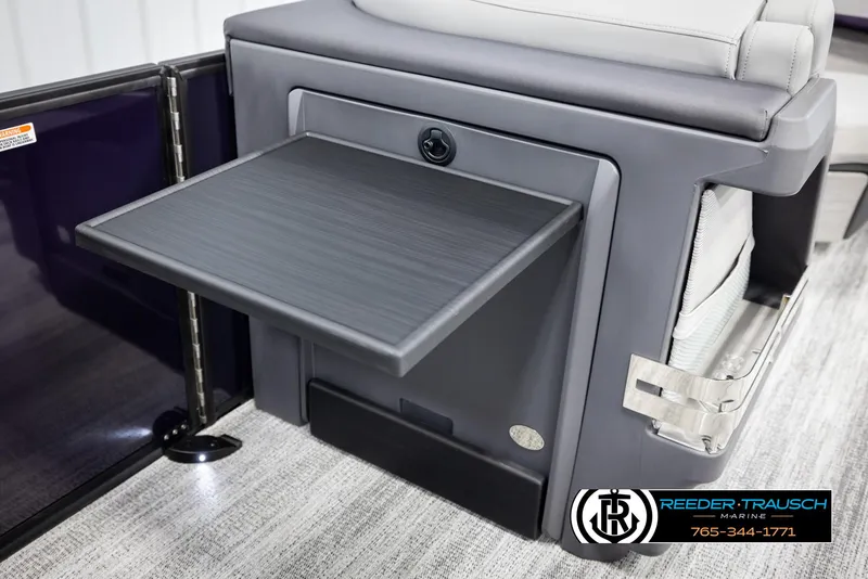 Slide: The Image of Fold-out table on 2025 Bennington 22 MFBSE boat, featuring sleek design and modern functionality. - 23