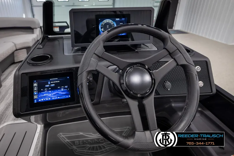 Slide: The Image of Steering wheel and dashboard of 2025 Bennington 22 MFBSE boat with digital displays. - 26