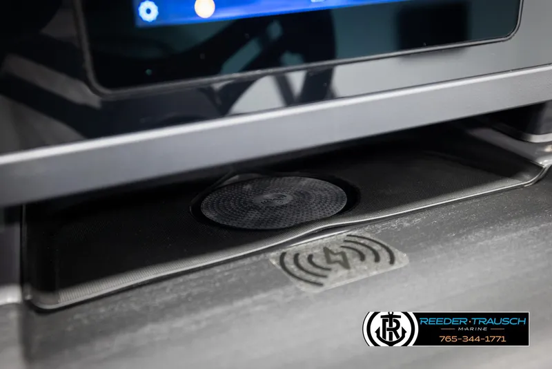 Slide: The Image of Wireless charging pad in 2025 Bennington 22 MFBSE boat dashboard. - 31