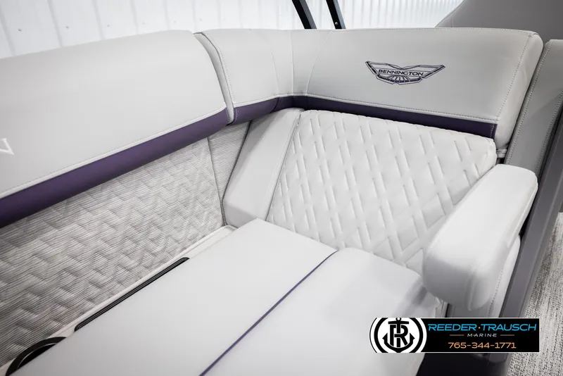 Slide: The Image of 2025 Bennington 22 MFBSE boat interior with luxurious quilted seating and elegant design. - 36