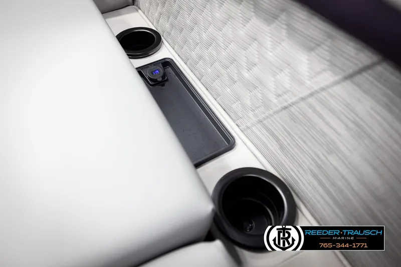 Slide: The Image of Interior of 2025 Bennington 22 MFBSE boat with cup holders and charging station. - 37