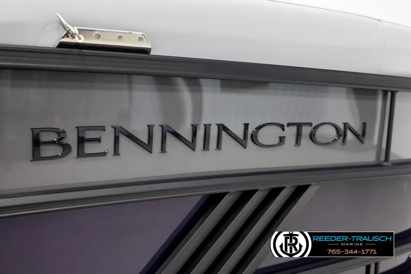 Slide: The Image of 2025 Bennington 22 MFBSE boat, sleek design with brand logo, Reeder-Trausch Marine contact. - 44