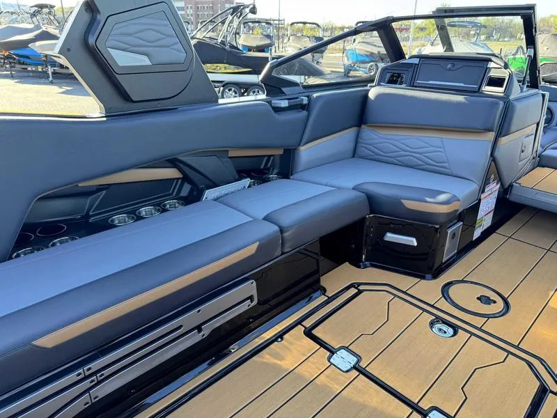 Slide: The Image of 2025 Supra SL boat interior with luxurious seating and modern design features. - 10