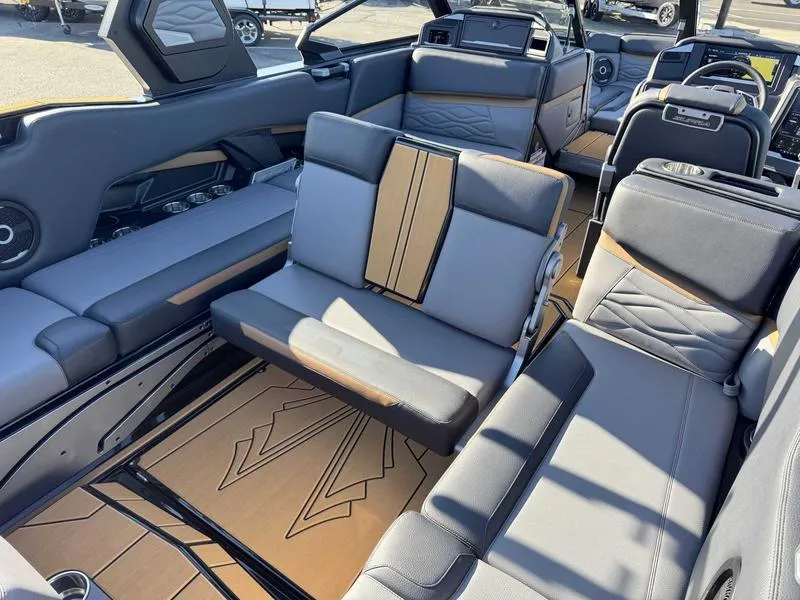 Slide: The Image of 2025 Supra SL boat interior with luxurious seating and modern design. - 15