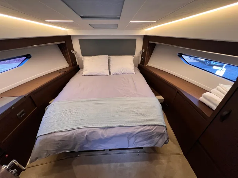 Slide: The Image of Luxurious cabin interior of 2023 Prestige 520 yacht with cozy bed and modern design. - 19