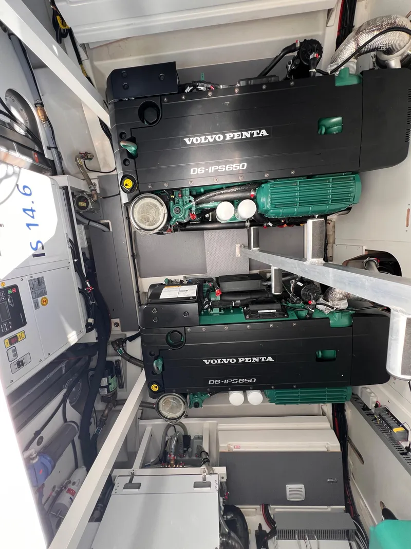 Slide: The Image of Engine room of a 2023 Prestige 520 yacht with Volvo Penta engines. - 24