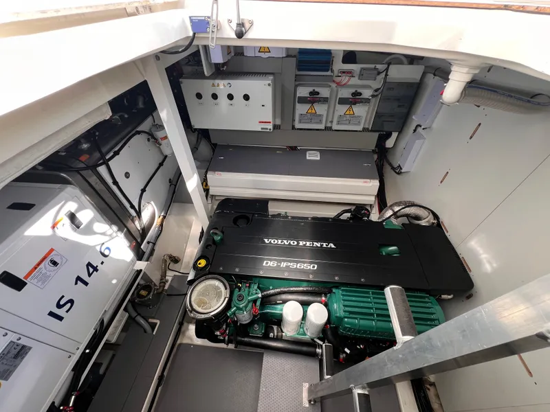 Slide: The Image of Engine room of 2023 Prestige 520 yacht with Volvo Penta engine and electrical systems. - 27