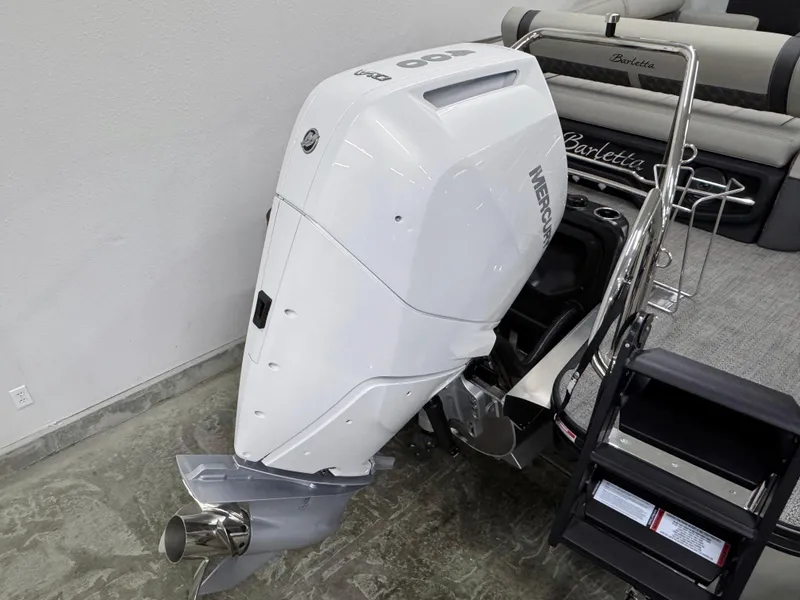 Slide: The Image of 2025 Barletta Reserve Leggera R26UCA with powerful Mercury outboard engine. - 11