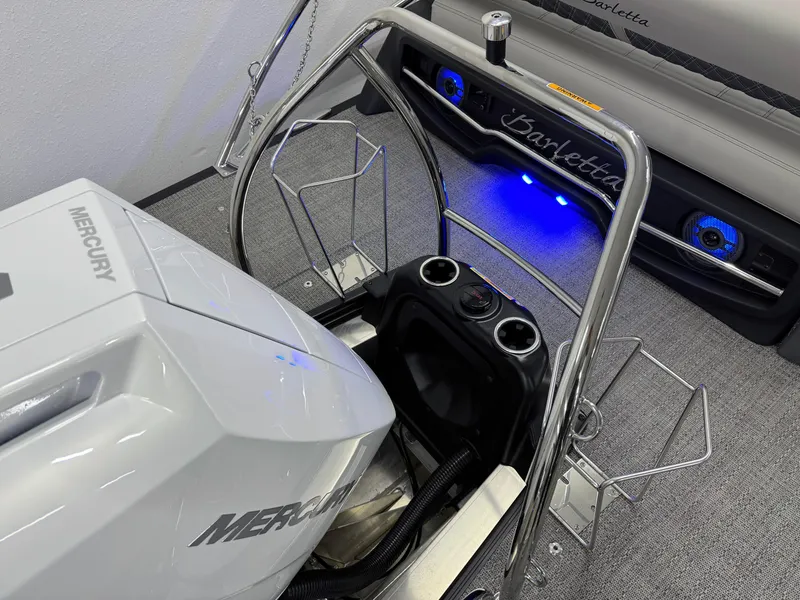 Slide: The Image of 2025 Barletta Reserve Leggera R26UCA boat with Mercury engine and illuminated speakers. - 13