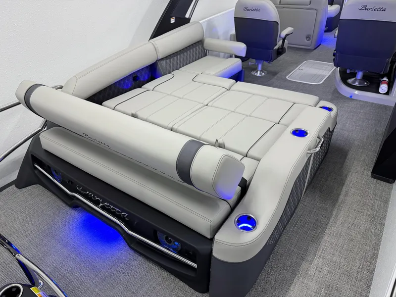 Slide: The Image of Luxurious interior of 2025 Barletta Reserve Leggera R26UCA with plush seating and ambient lighting. - 14