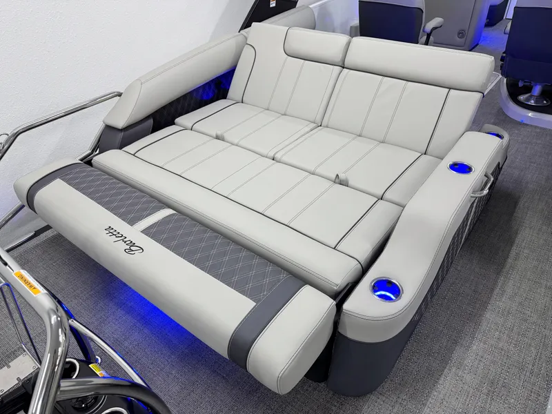 Slide: The Image of 2025 Barletta Reserve Leggera R26UCA boat seating with cup holders and modern design. - 22