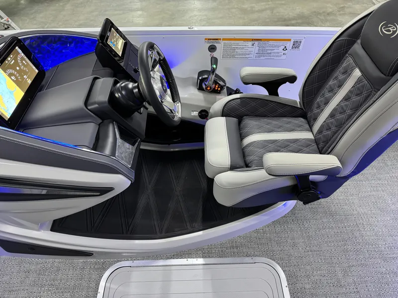 Slide: The Image of 2025 Barletta Reserve Leggera R26UCA cockpit with modern controls and luxurious seating. - 26