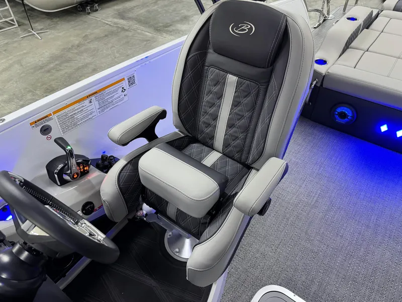 Slide: The Image of Luxurious captain's chair in 2025 Barletta Reserve Leggera R26UCA boat interior. - 28