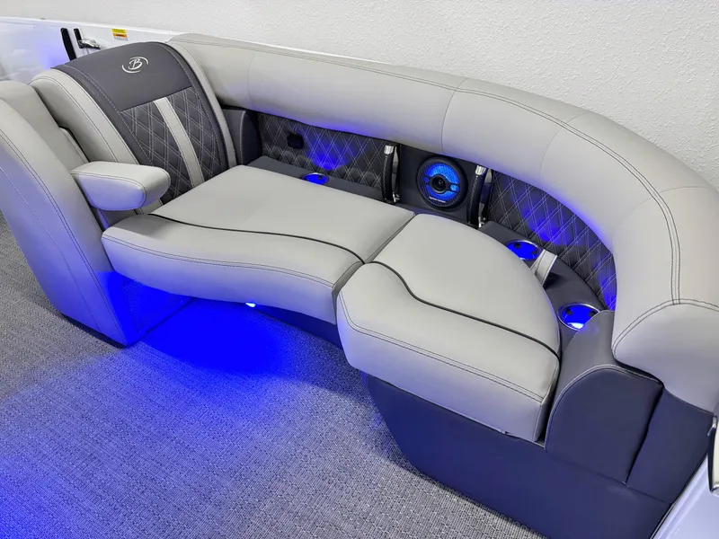 Slide: The Image of Luxurious seating in the 2025 Barletta Reserve Leggera R26UCA with blue LED lighting. - 43