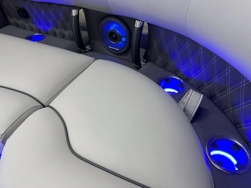 Slide: The Image of Luxurious interior of 2025 Barletta Reserve Leggera R26UCA with blue LED cup holders. - 44