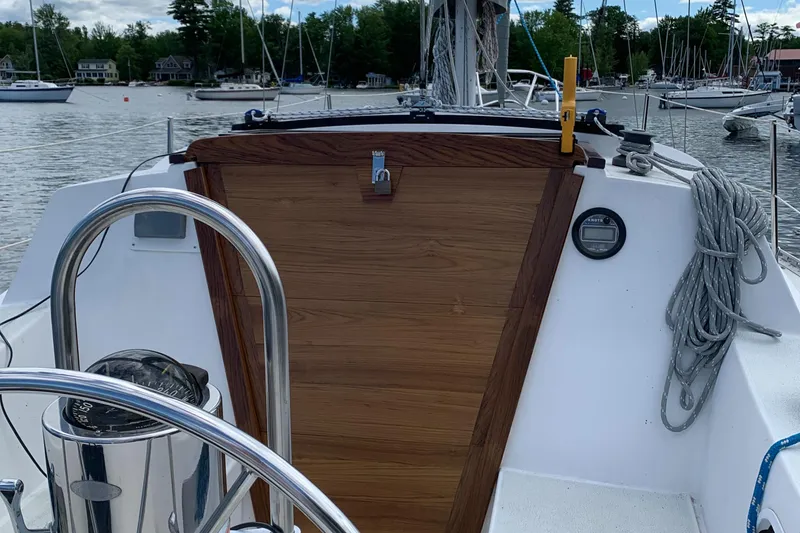 Slide: The Image of Cockpit view of 1984 Islander 28 sailboat docked in a marina. - 8