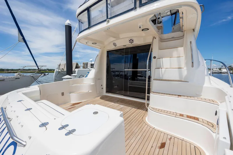 Slide: The Image of 2008 Sea Ray 58 Sedan Bridge yacht with spacious deck and elegant design. - 11
