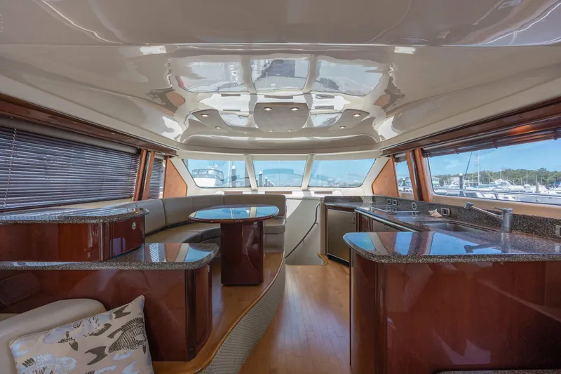 Slide: The Image of Luxurious interior of a 2008 Sea Ray 58 Sedan Bridge yacht with modern furnishings. - 28
