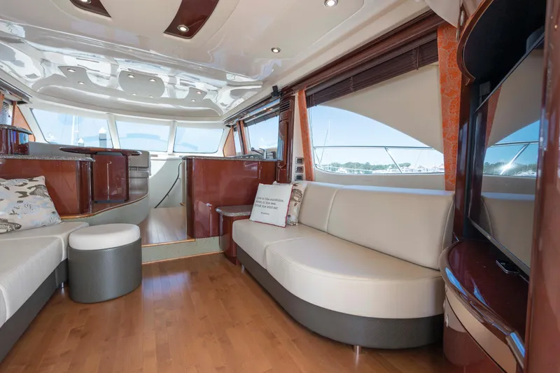 Slide: The Image of Luxurious interior of 2008 Sea Ray 58 Sedan Bridge yacht with elegant seating and wood finishes. - 29