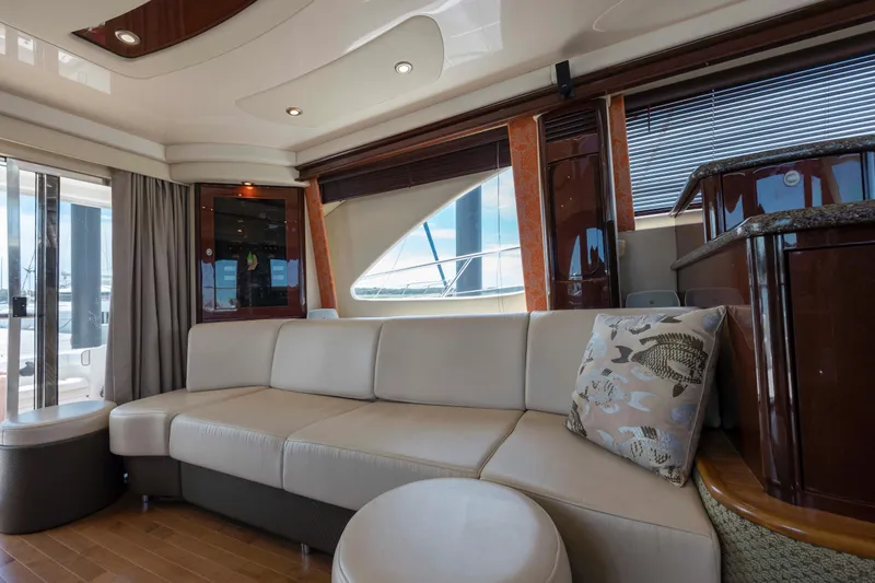 Slide: The Image of Luxurious interior of 2008 Sea Ray 58 Sedan Bridge yacht with elegant seating. - 32