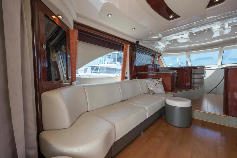 Slide: The Image of Luxurious interior of 2008 Sea Ray 58 Sedan Bridge yacht with elegant seating and wood finishes. - 34